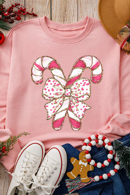 Claire - Sweatshirt mit hängenden Schultern, Weihnachtsgrafik und rosa Schleife